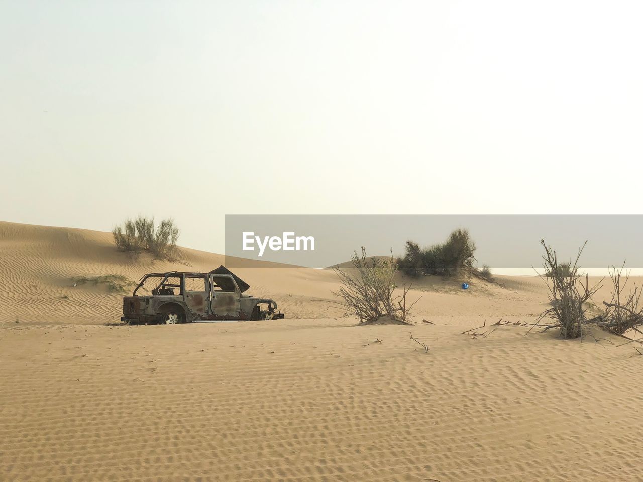 Scenic view of desert against clear sky