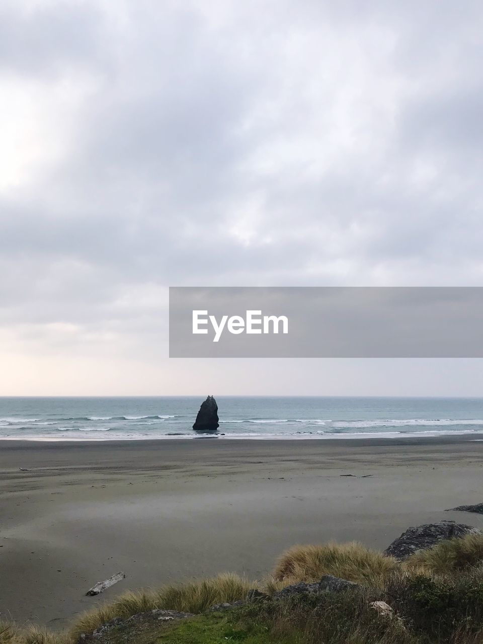 VIEW OF BEACH AGAINST SKY