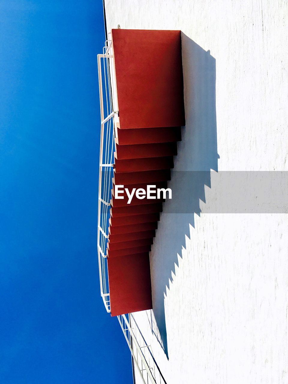 Low angle view of staircase against clear sky