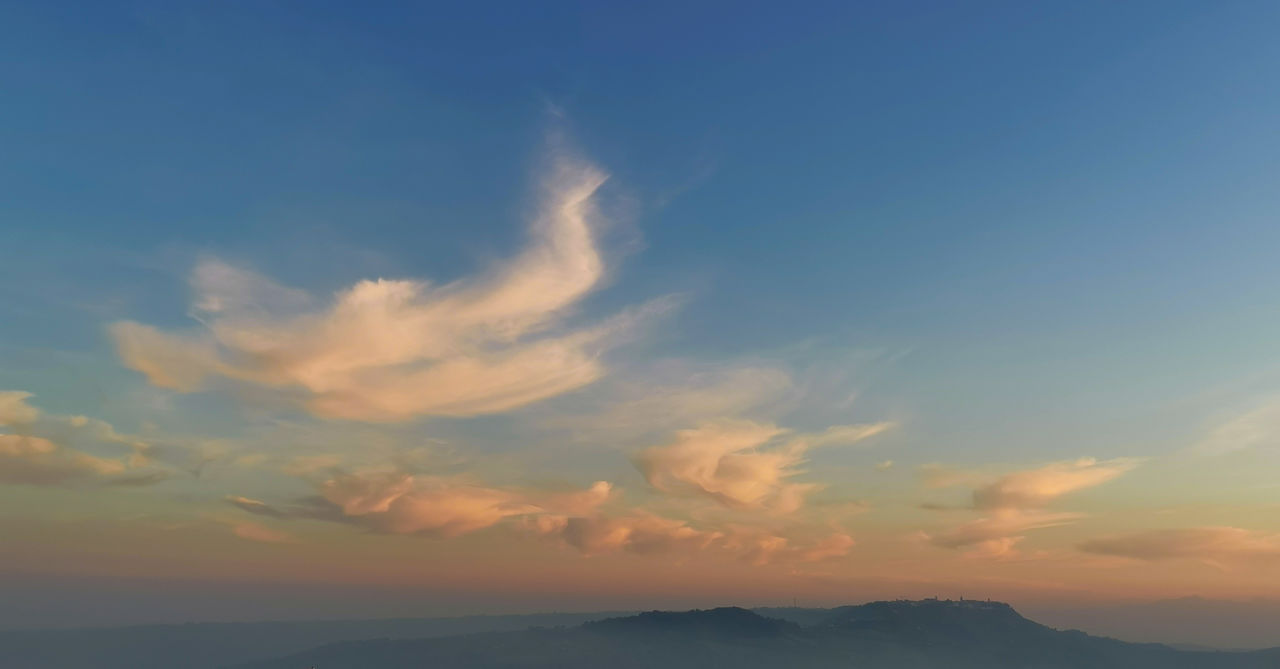 Low angle view of dramatic sky during sunset