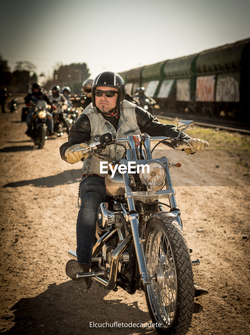 MAN RIDING BICYCLES ON ROAD