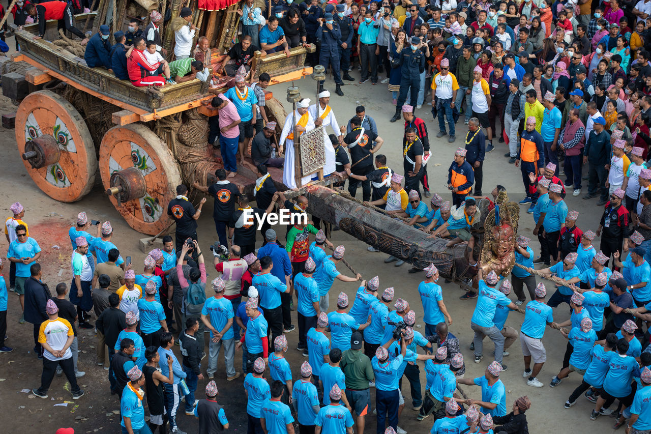 Devotees pull chariots as they take part in the festivities to mark the rato machindranath chariot.