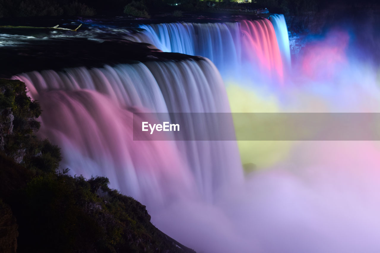 Illuminated niagara falls at night 