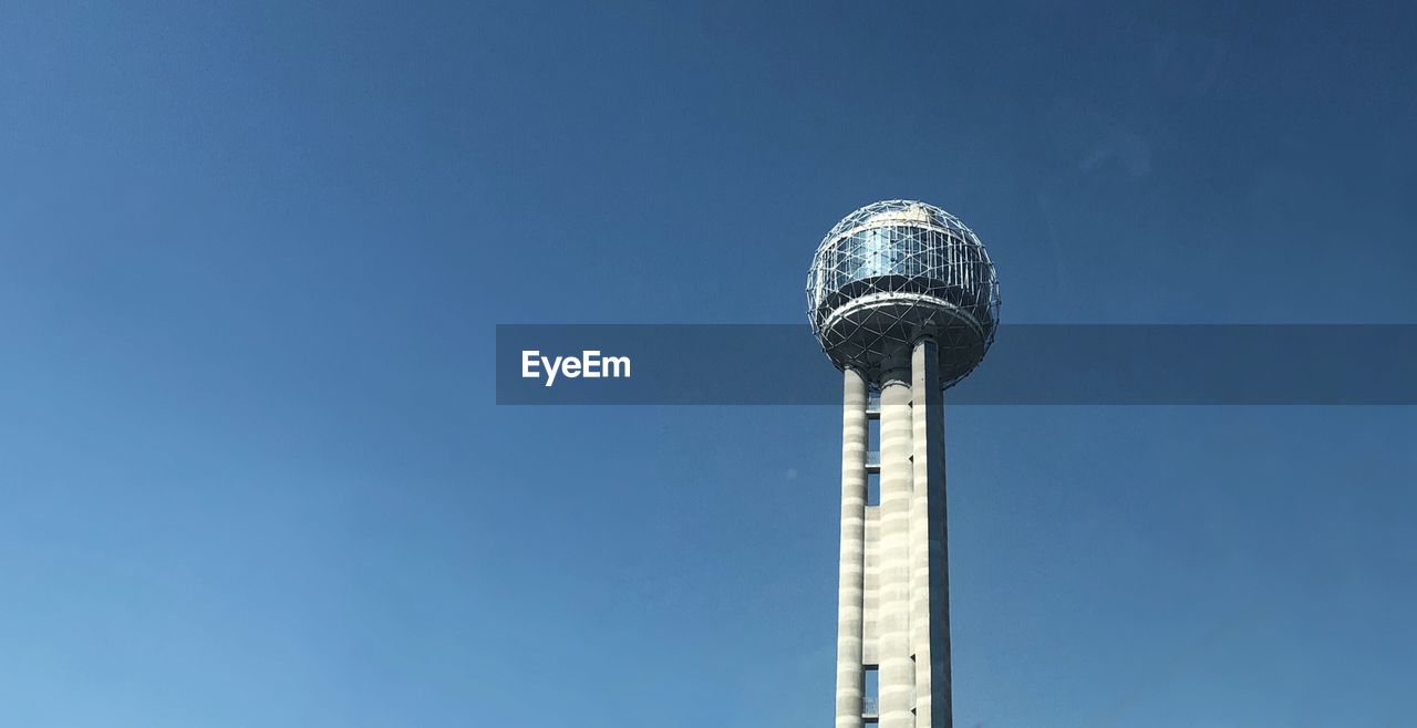 Low angle view of reunion tower and building against clear sky in dallas, tx