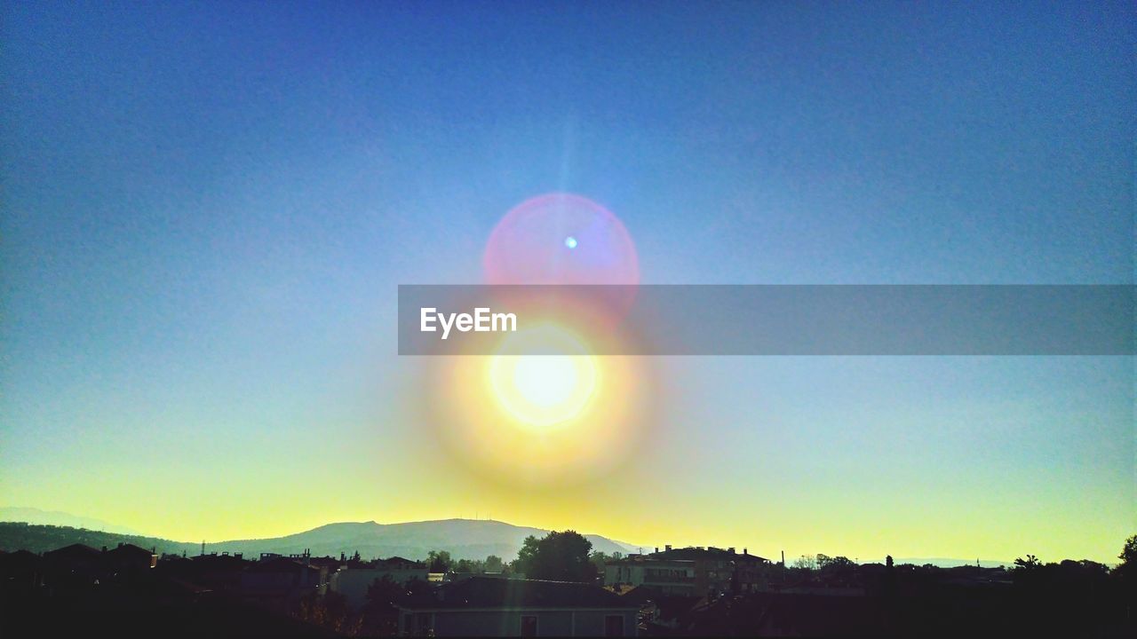 SCENIC VIEW OF LANDSCAPE AGAINST SUNSET SKY