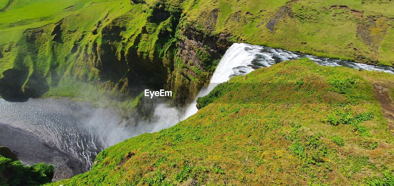 Scenic view skógafoss waterfall