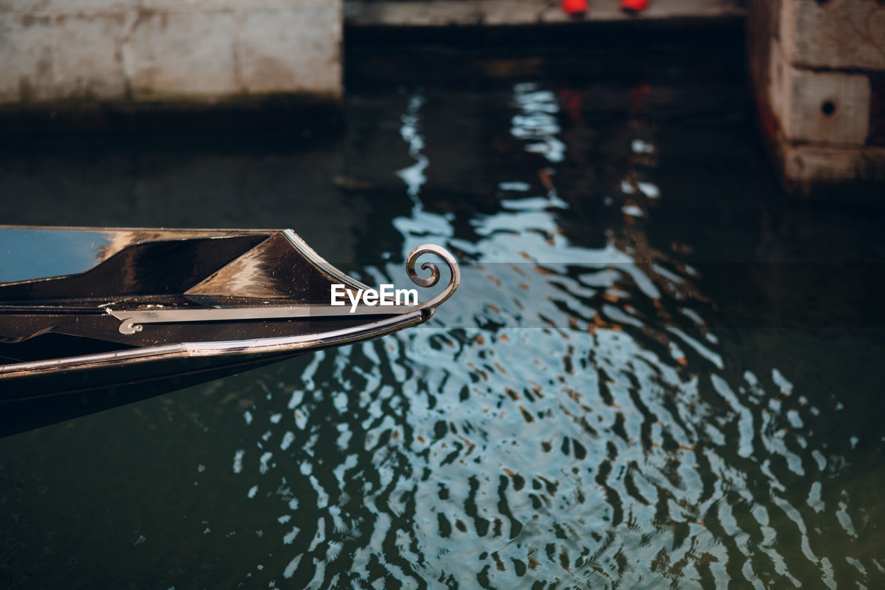 Cropped image of gondola in canal