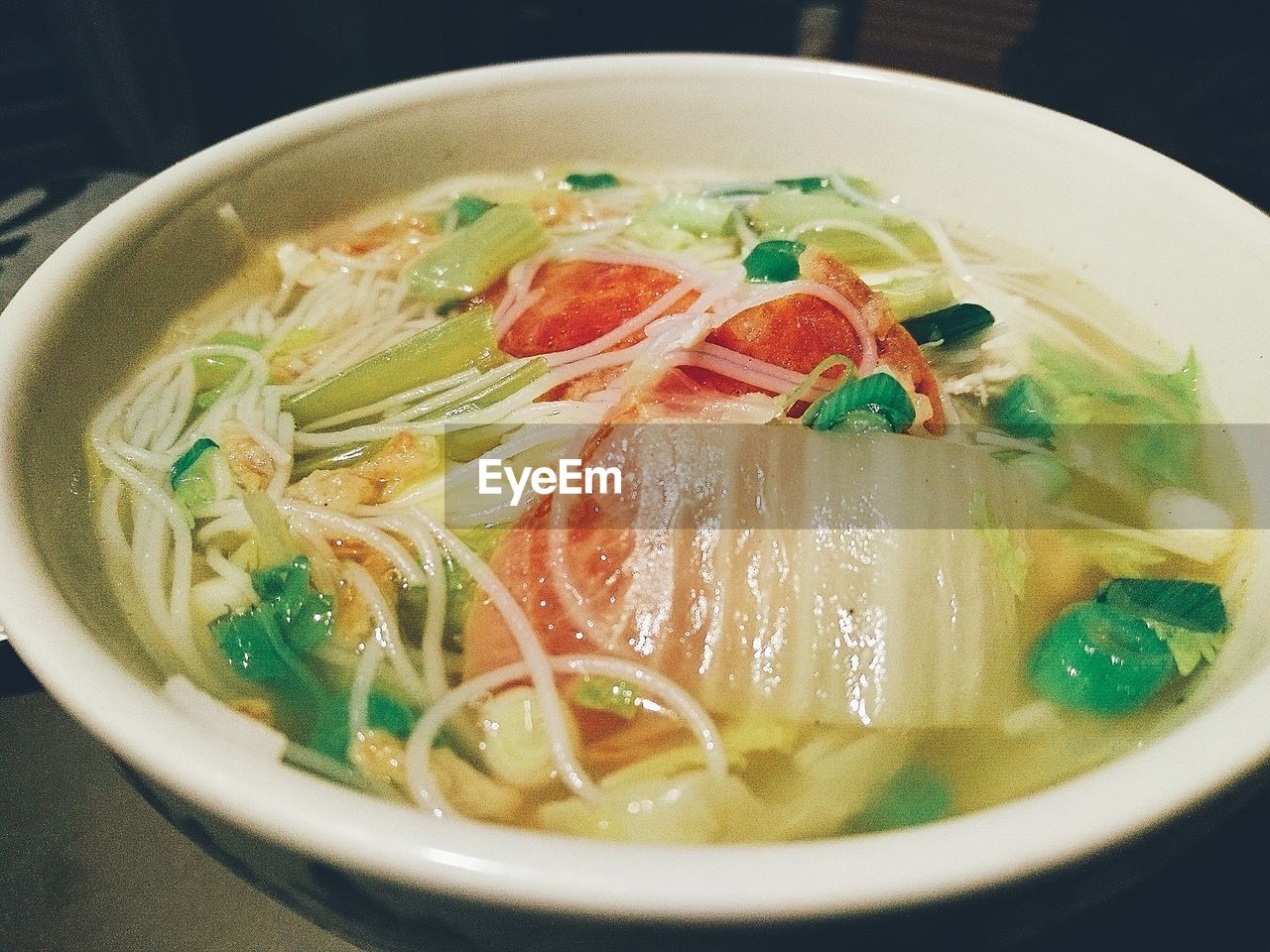 CLOSE-UP OF SOUP WITH BOWL