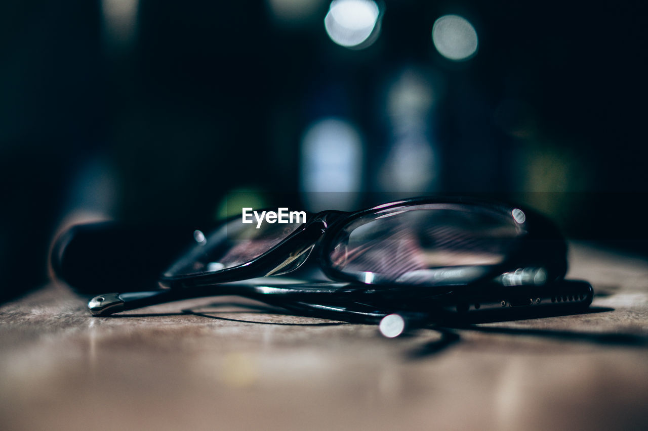 Close-up of eyeglasses on table