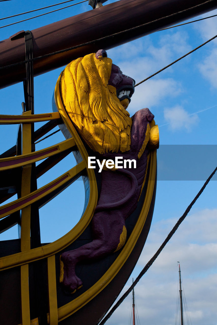 Low angle view of statue against sky