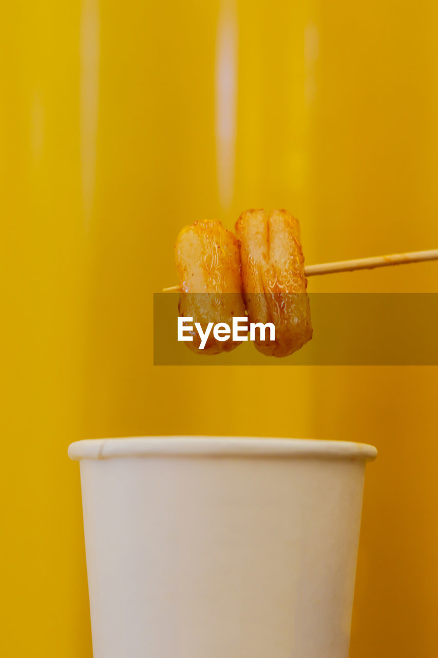 Close-up of street food meal in glass