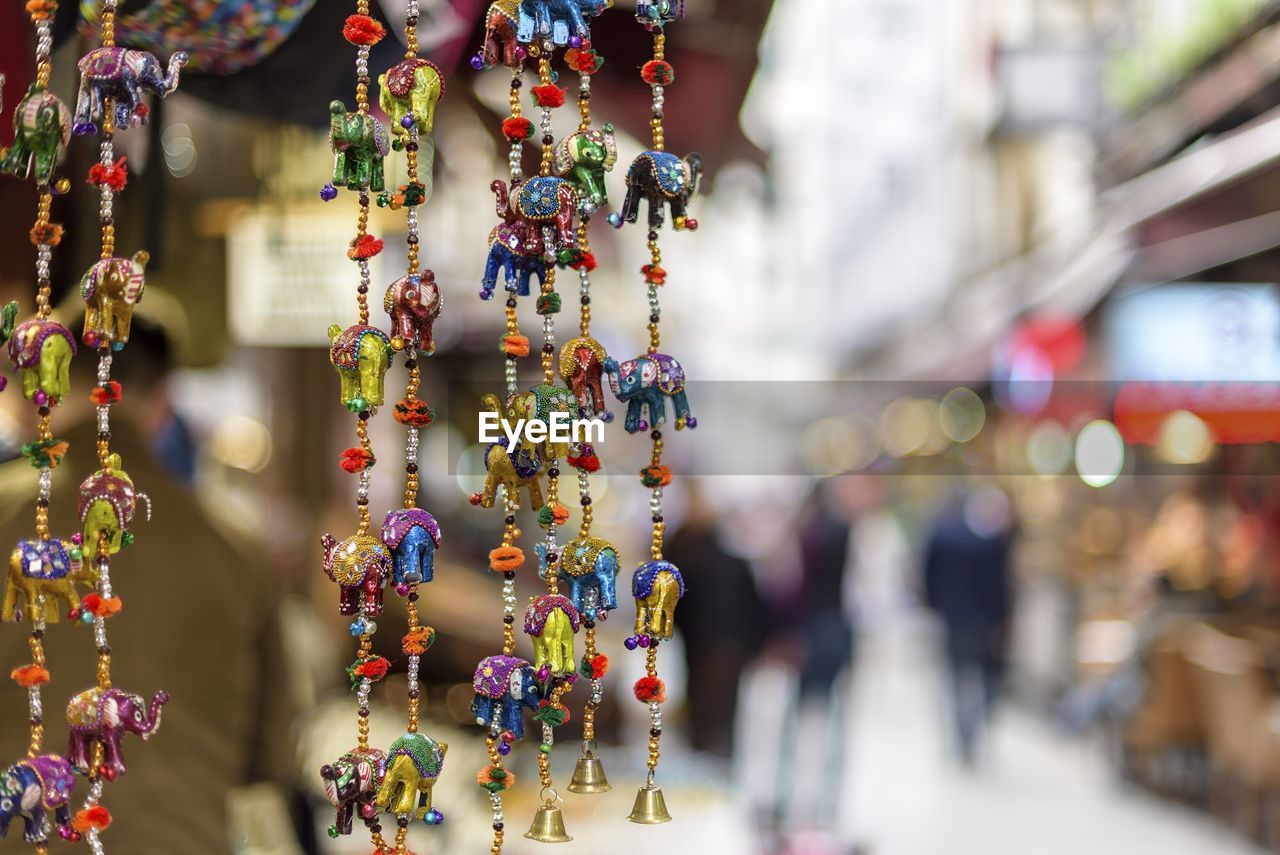 Close-up of decorations for sale at street market