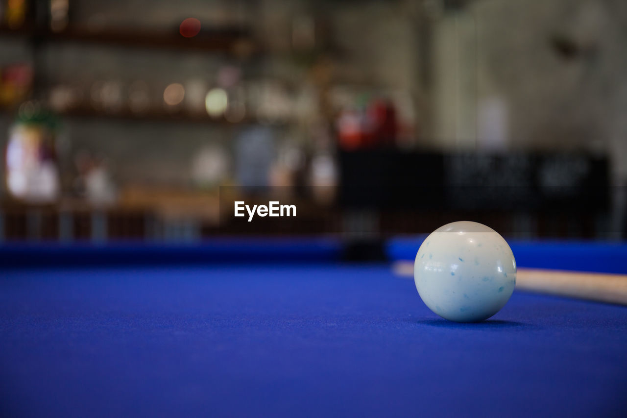 Close-up of ball on pool table