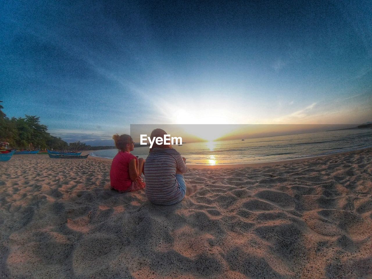 SCENIC VIEW OF SEA DURING SUNSET