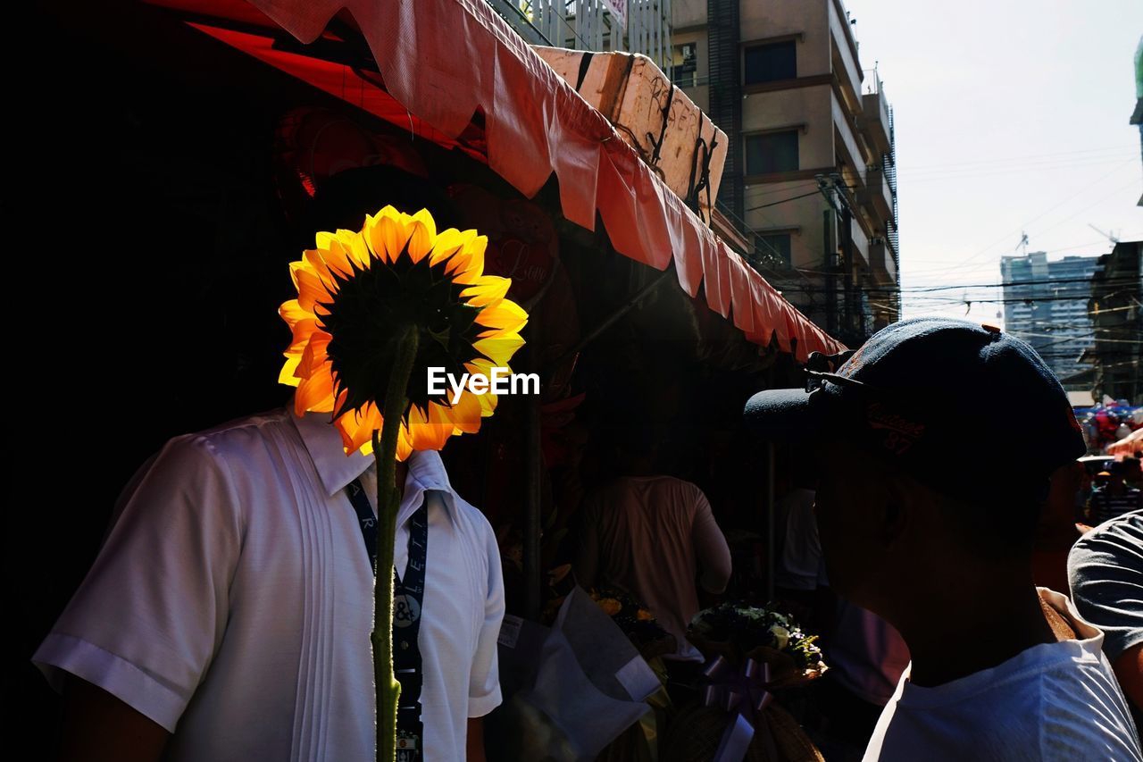 Men talking at market