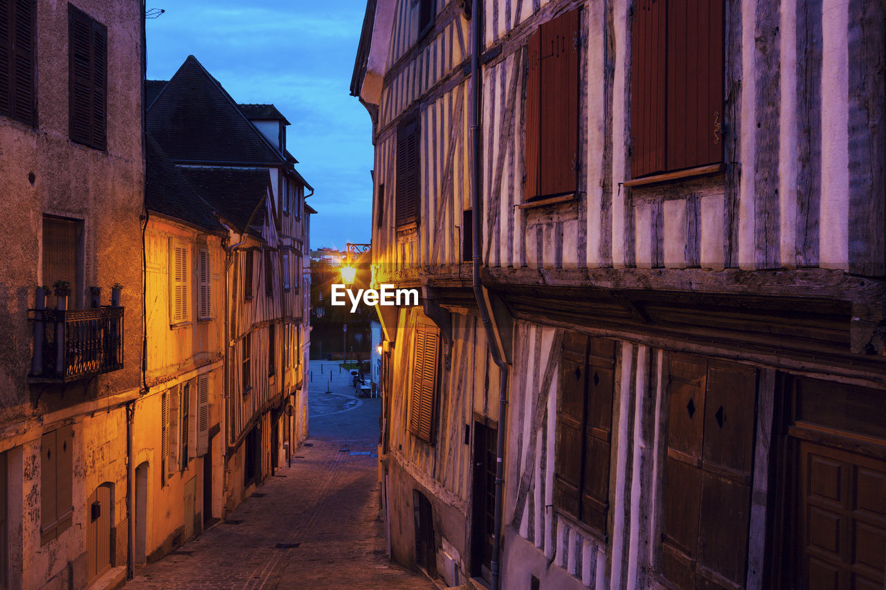 street amidst buildings in city