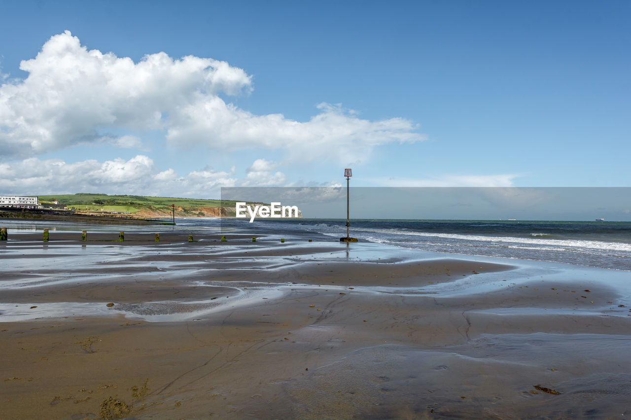 Scenic view of beach against sky