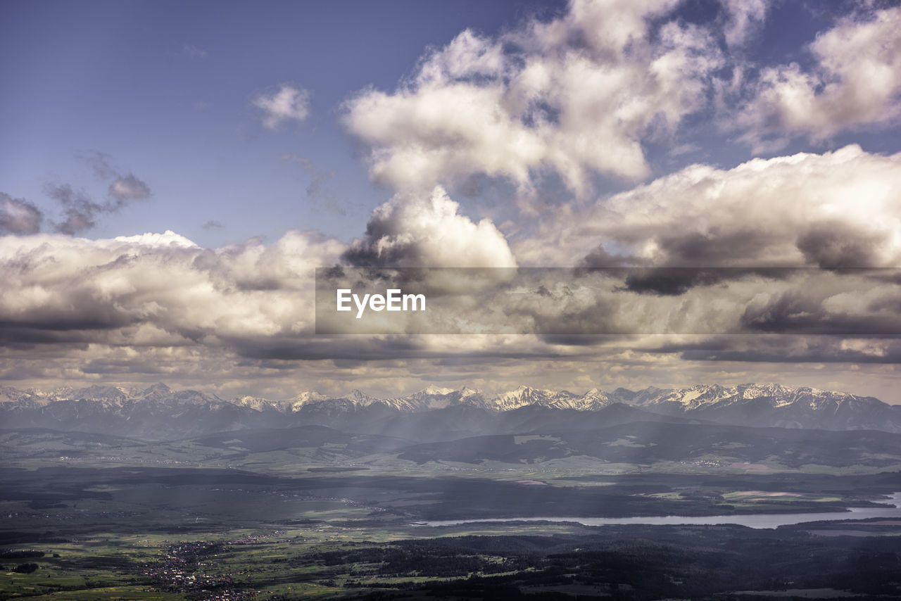 AERIAL VIEW OF CLOUDS OVER SEA