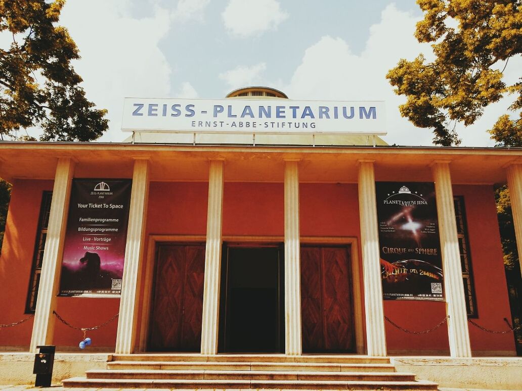 LOW ANGLE VIEW OF INFORMATION SIGN ON BUILDING