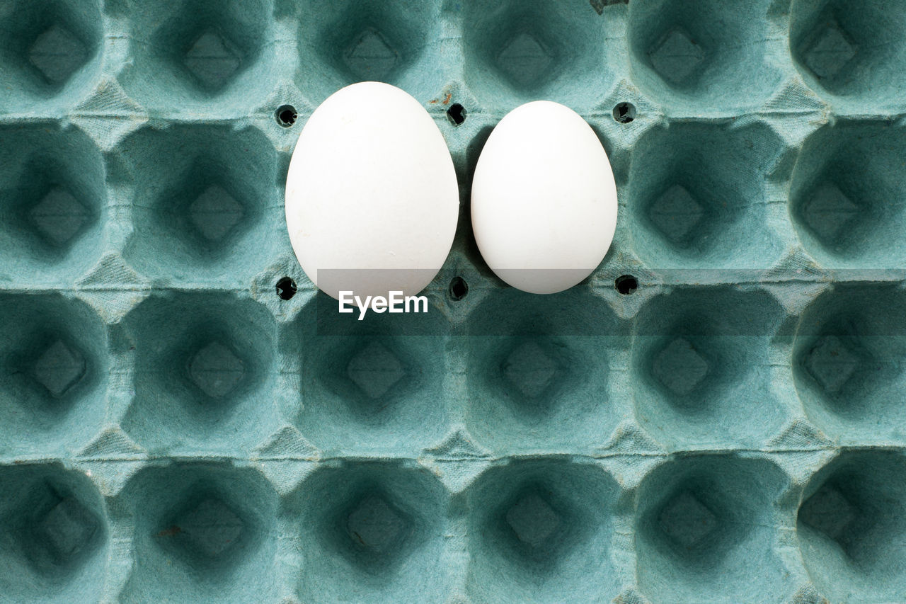 Directly above shot of eggs in carton