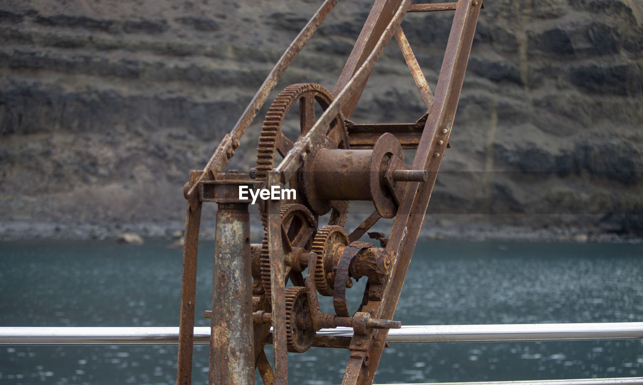 water, vehicle, iron, sea, no people, metal, wood, day, transportation, focus on foreground, nautical vessel, rusty, nature, outdoors, rope, pulley, mast, mode of transportation, railing