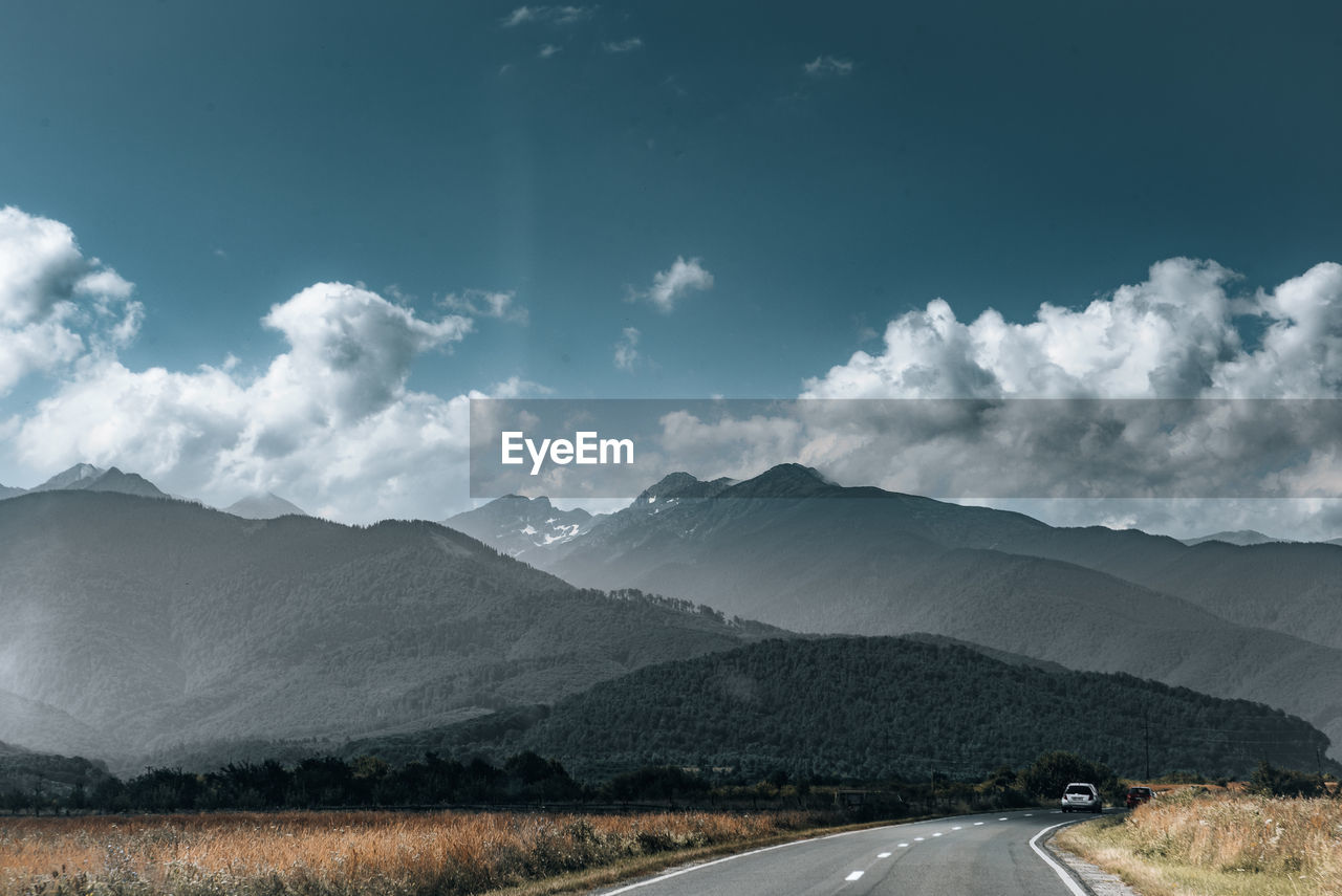 Road towards mountain range