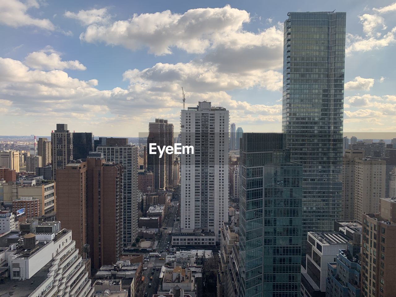 High angle view of buildings in city against sky