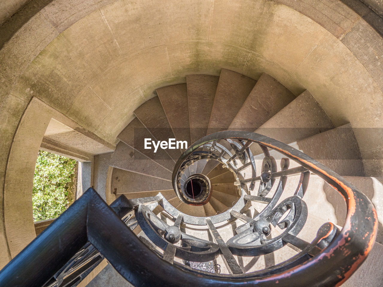 HIGH ANGLE VIEW OF SPIRAL STAIRCASE