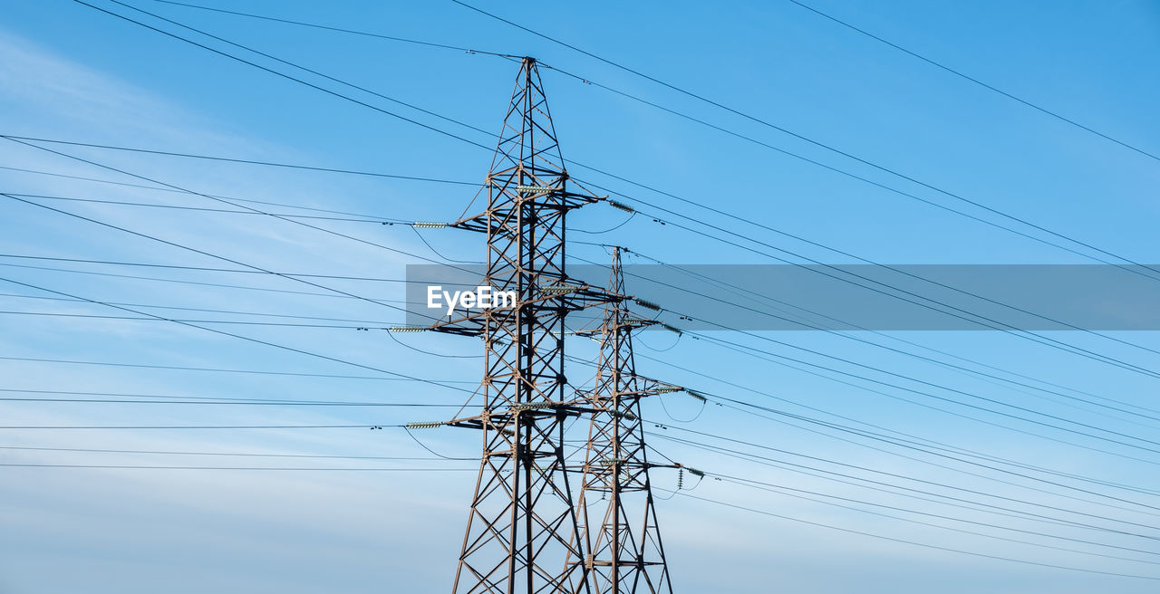 Electric tower and lines. energy supply. high electricity prices.