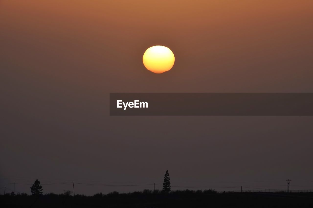 SCENIC VIEW OF ORANGE SKY