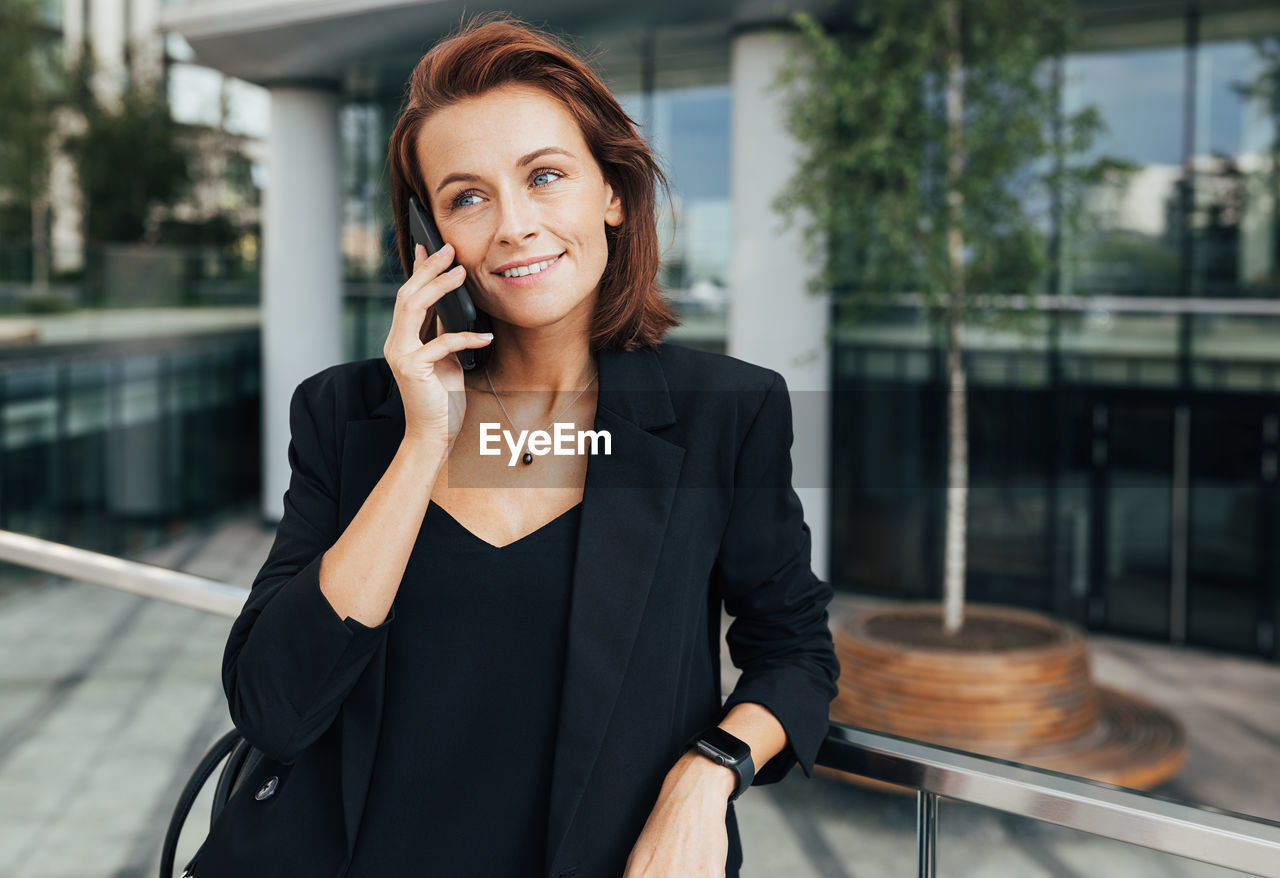 young businesswoman talking on phone