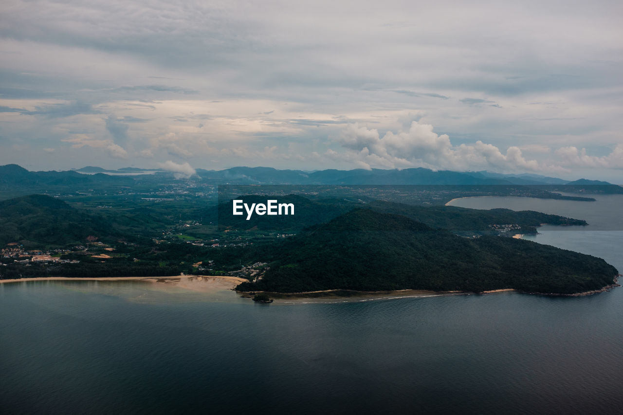 Aerial view of bay against sky