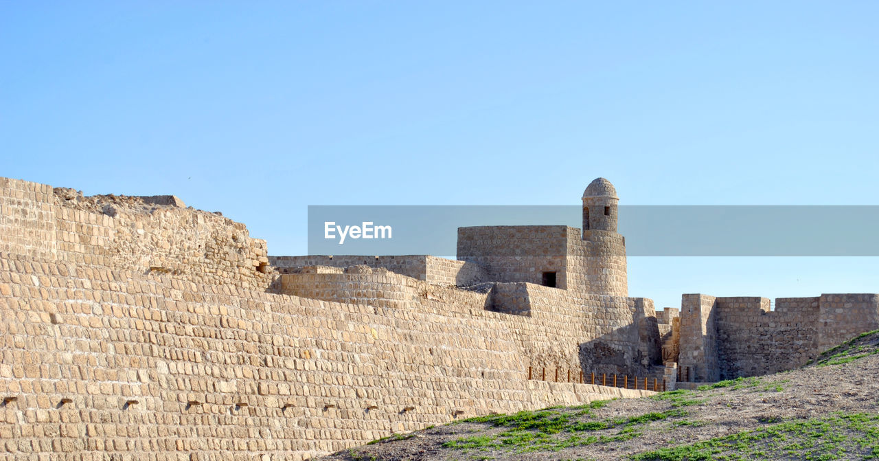 OLD RUINS AGAINST SKY