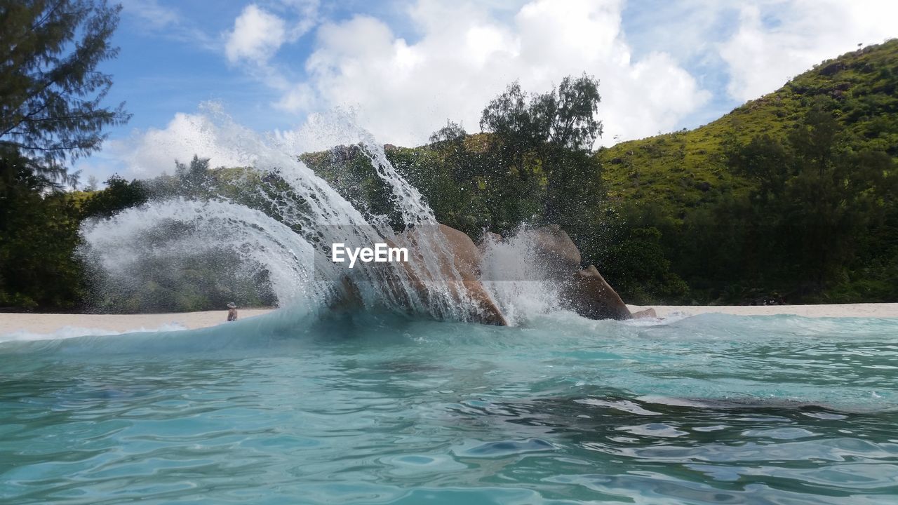 SCENIC VIEW OF SWIMMING POOL AGAINST SKY