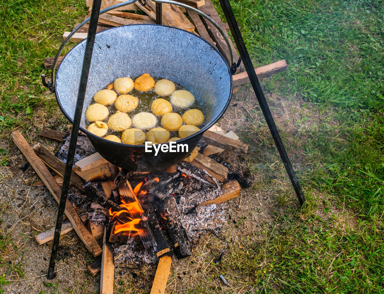 HIGH ANGLE VIEW OF VARIOUS FOOD ON BARBECUE GRILL