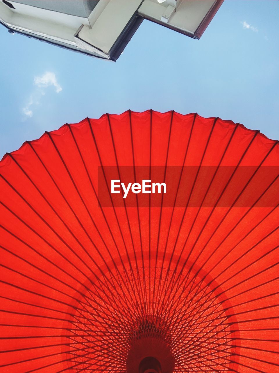 LOW ANGLE VIEW OF RED BRIDGE AGAINST SKY