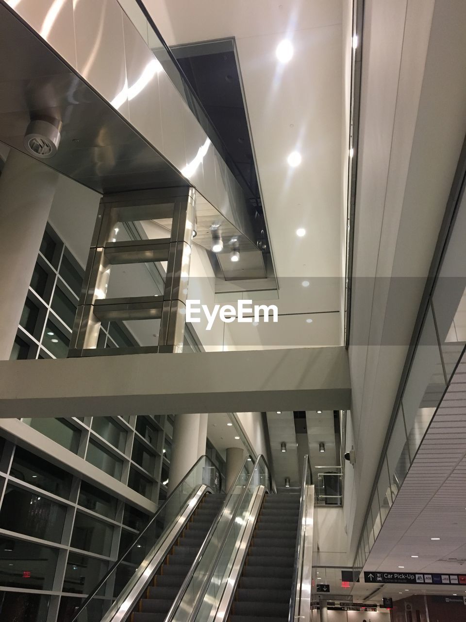 Low angle view of escalators in shopping mall