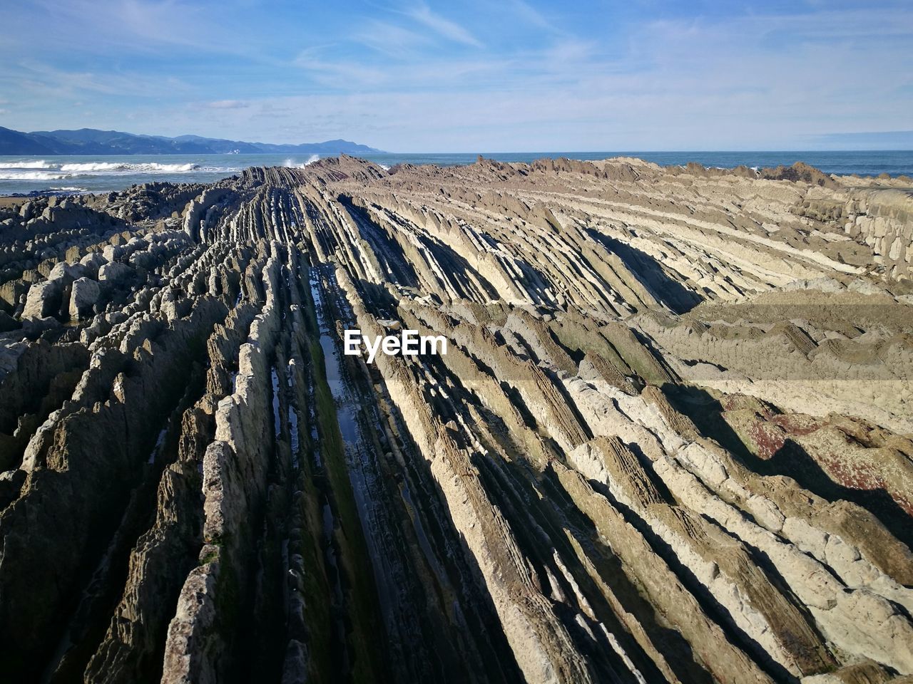 View of rock formations against sky