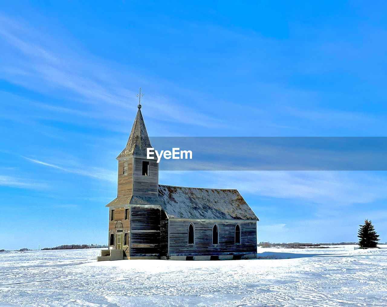 Abandons church in the snowy prairie
