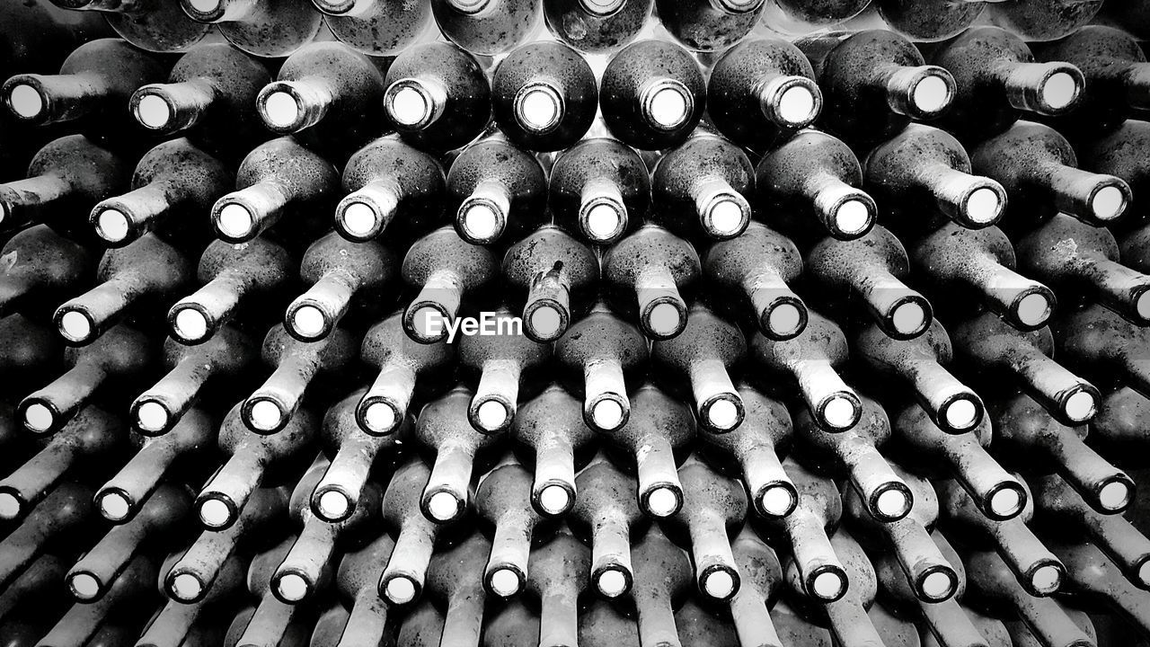 Full frame shot of bottle racks 