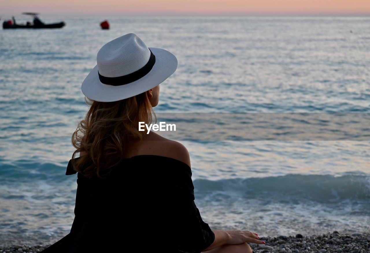 Rear view of woman on beach