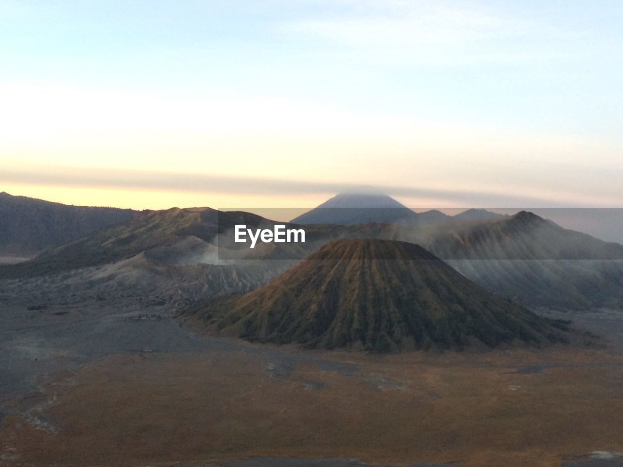 Scenic view of mount bromo against sky during sunset