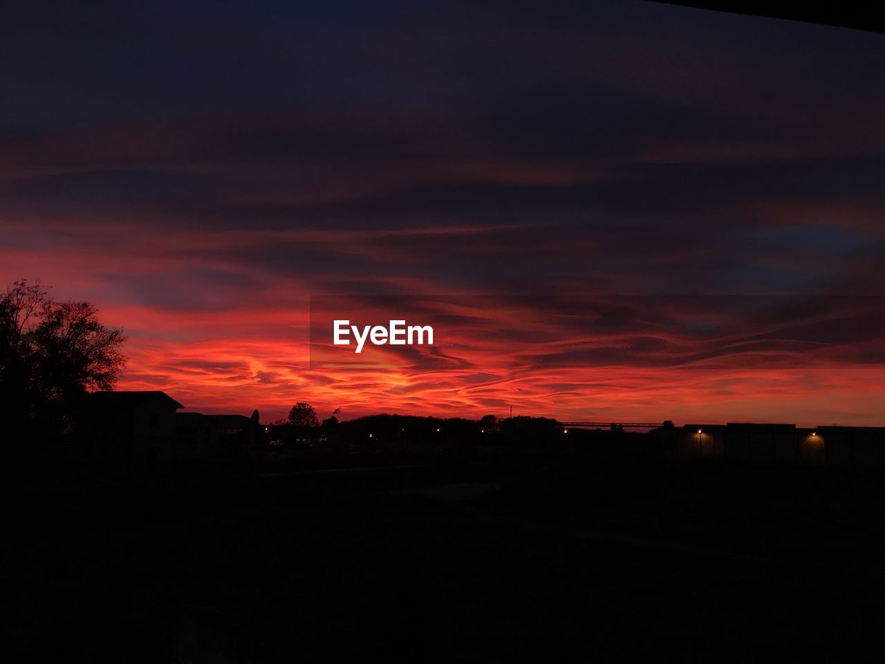 SILHOUETTE LANDSCAPE AGAINST SKY DURING SUNSET