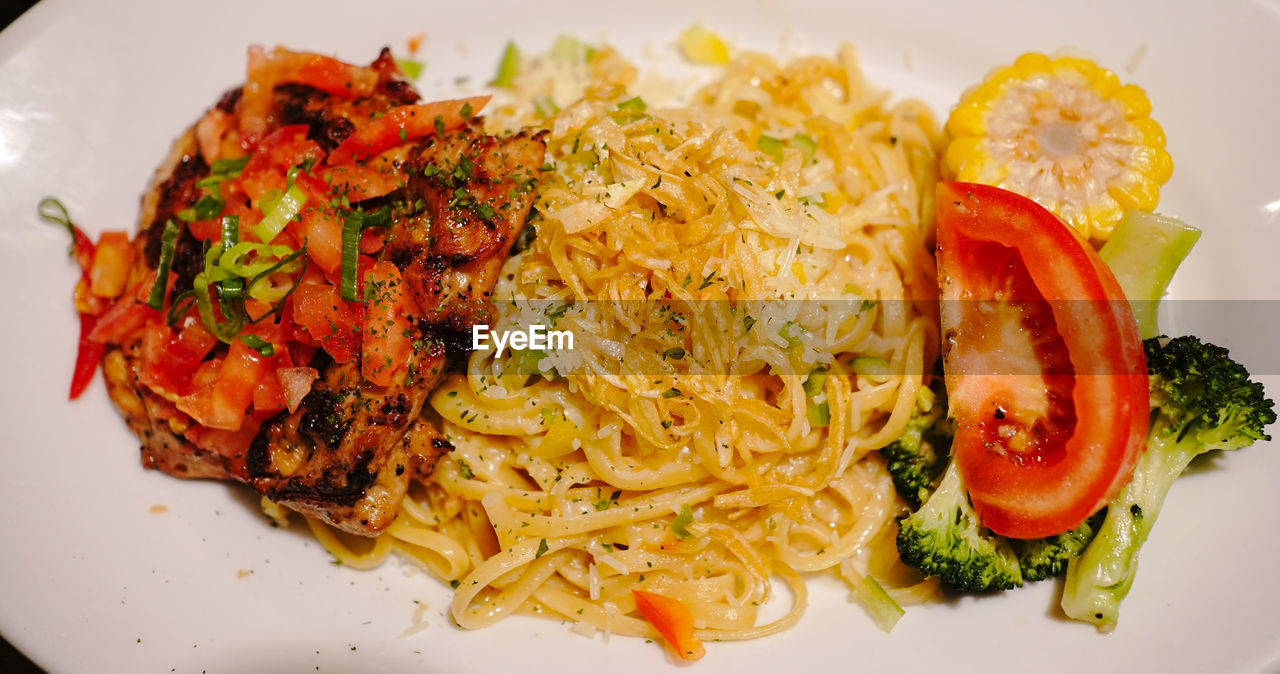 food, food and drink, healthy eating, plate, freshness, vegetable, wellbeing, dish, spaghetti, cuisine, meal, thai food, italian food, no people, produce, fruit, close-up, indoors, pasta, serving size, seafood, high angle view, tomato, still life, restaurant, meat
