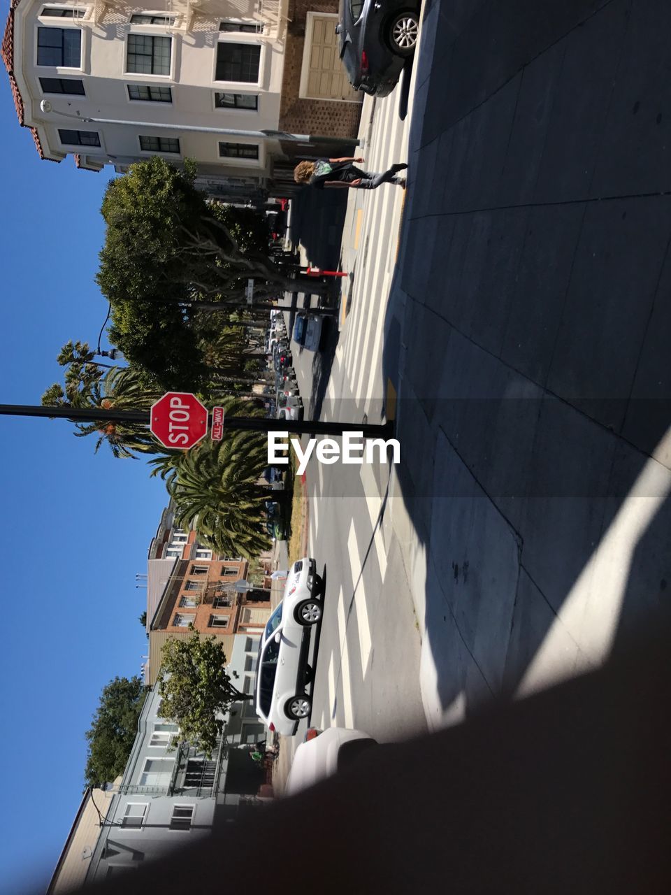 VIEW OF PEOPLE WALKING ON ROAD