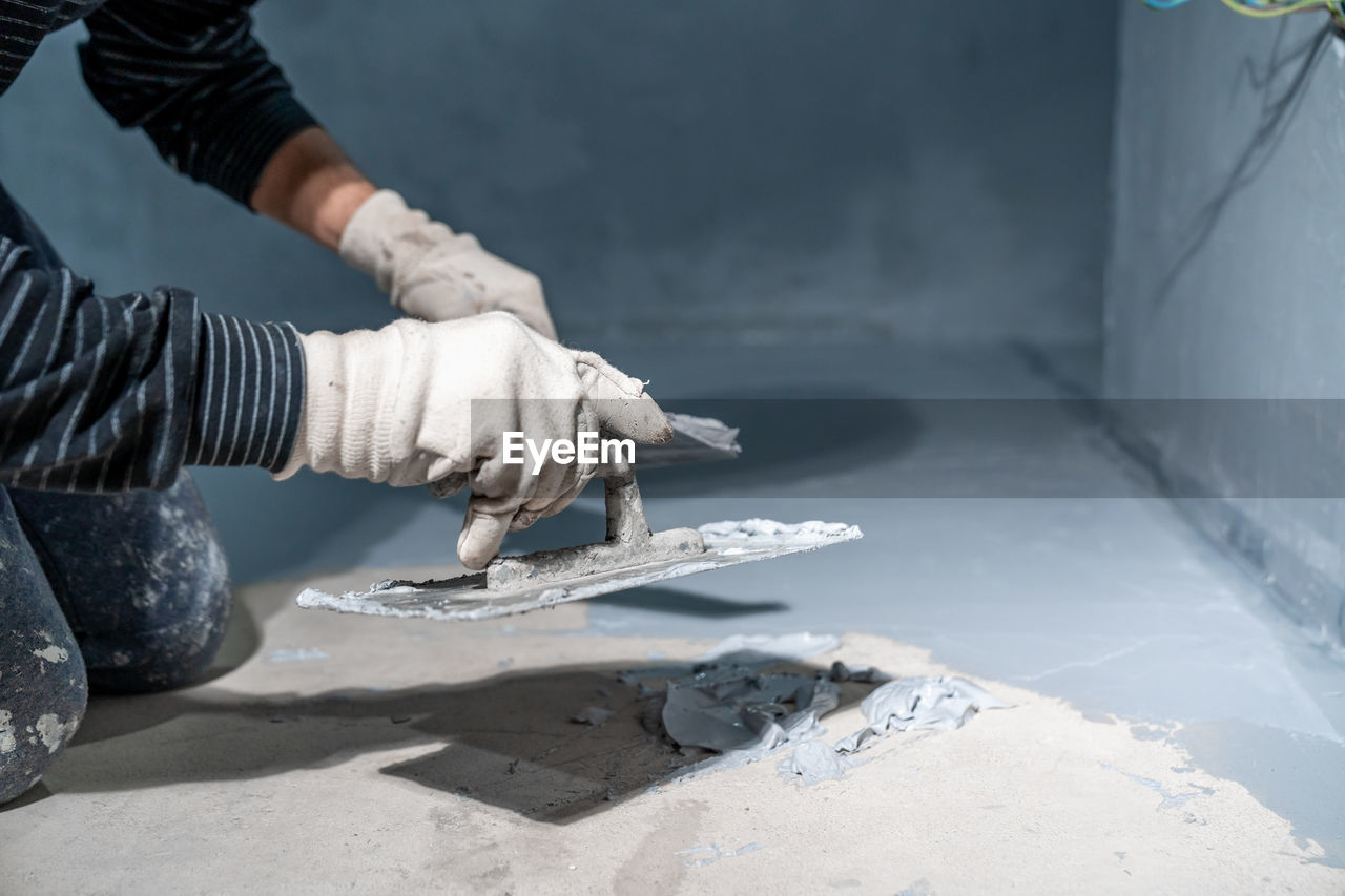 cropped image of man working at workshop