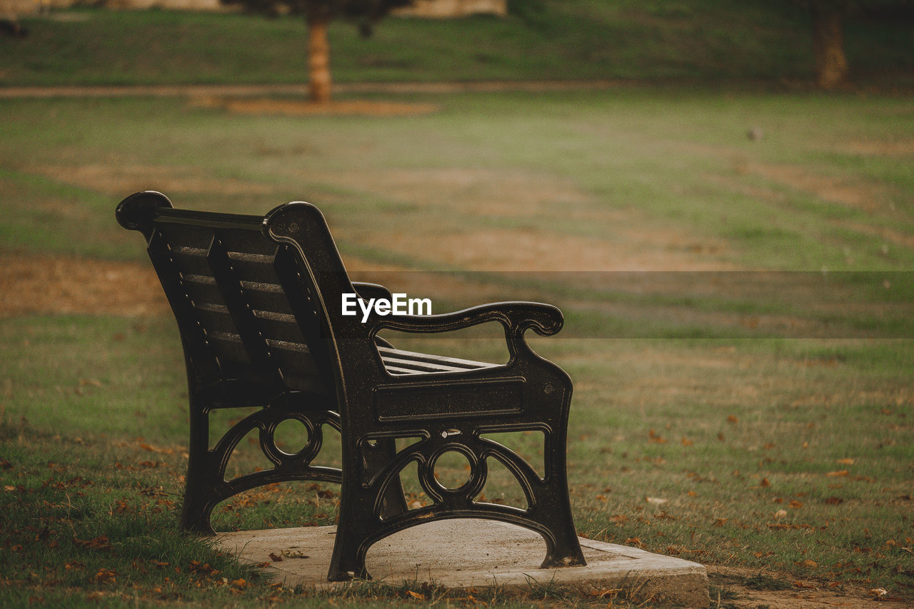 Empty bench in park