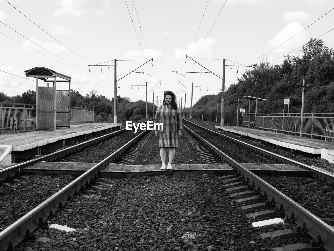 Rear view of railroad station against sky