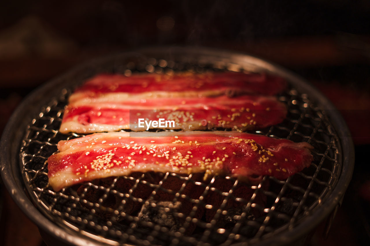 close-up of sushi on barbecue grill