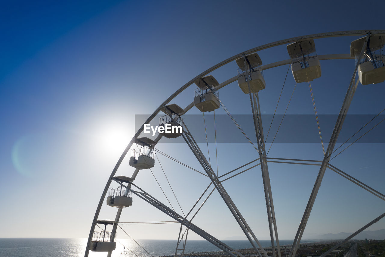 Aerial shot with a drone of a detail of a ferris wheel